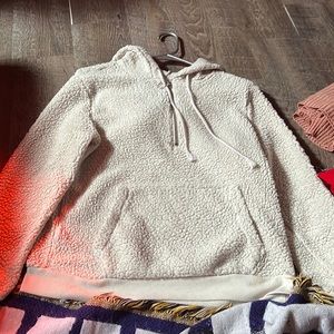 polyester sweater. it attracts lots stuff to it.